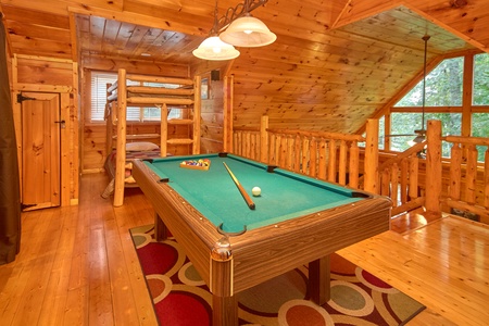 Pool table in the loft at Love Struck, a 1 bedroom cabin rental located in Pigeon Forge