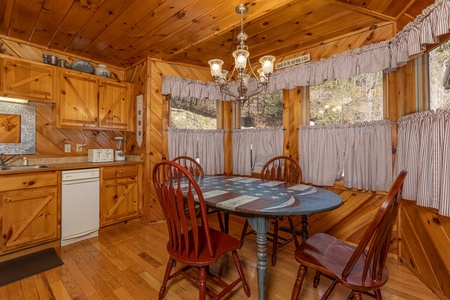 Kitchen table at Hatcher Mountain Retreat a 2 bedroom cabin rental located in Pigeon Forge