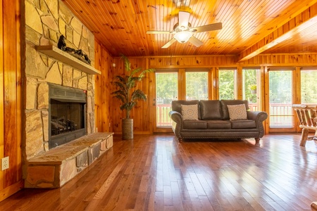 Living room with fireplace at 1 Crazy Cub, a 4 bedroom cabin rental located in Pigeon Forge