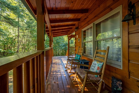 Porch seating at Fox Ridge, a 3 bedroom cabin rental located in Pigeon Forge