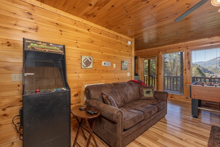 Arcade game in the game room at Bears Don't Bluff, a 3 bedroom cabin rental located in Pigeon Forge