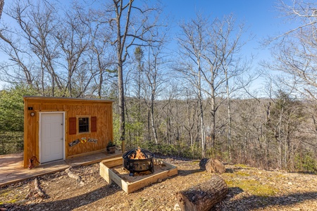 Fire pit at Nascar Nation, a 2 bedroom cabin rental located in Pigeon Forge