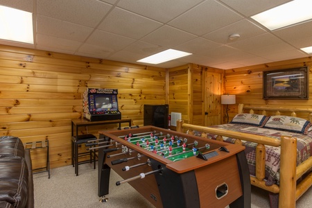 Foosball in the lower bedroom at Kelly's Cabin, a 1 bedroom cabin rental located in Pigeon Forge