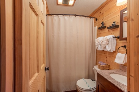 Bathroom with a tub and shower at License to Chill, a 3 bedroom cabin rental located in Gatlinburg