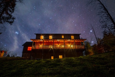 Back Exterior at Night at 3 Crazy Cubs, a 5 bedroom cabin rental located in pigeon forge
