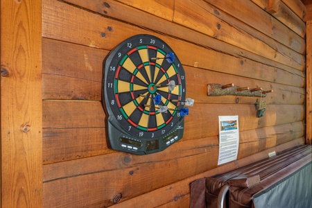 Dart board at Moonlit Pines, a 2 bedroom cabin rental located in Pigeon Forge