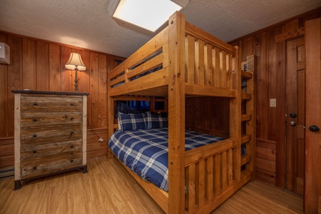 Queen sized bunk beds at Best View Ever, a 5 bedroom cabin rental located in Pigeon Forge
