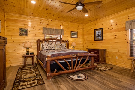 Bedroom With Log Furniture at Angler's Ridge