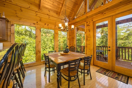 Kitchen table at Moonbeams & Cabin Dreams, a 3 bedroom cabin rental located in Pigeon Forge