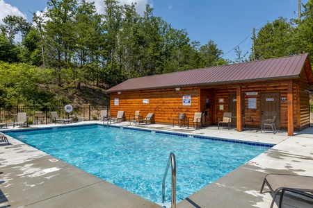 Resort pool for guests at Away From it All, a 1 bedroom cabin rental located in Pigeon Forge