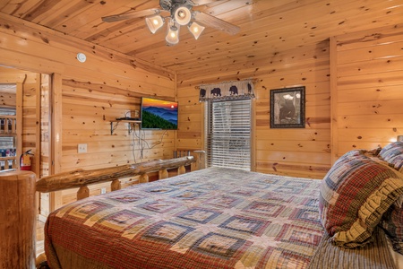 Bedroom with log bed at Natural Wonder, a 4 bedroom cabin rental located in Gatlinburg