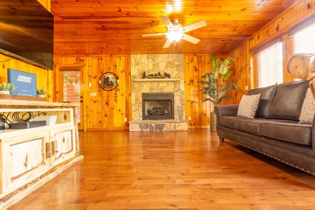 Living room amenities at 1 Crazy Cub, a 4 bedroom cabin rental located in Pigeon Forge