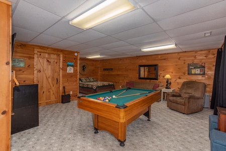 Pool table in the game room A View for You, a 1 bedroom cabin rental located in Pigeon Forge