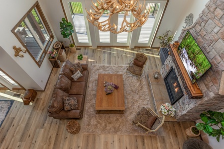 Looking down at the living room at Mountain Celebration, a 4 bedroom cabin rental located in Gatlinburg