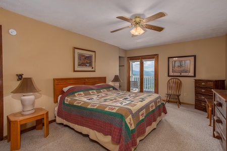 Bedroom with king-sized bed at Black Bear Ridge, a 3-bedroom cabin rental located in Pigeon Forge
