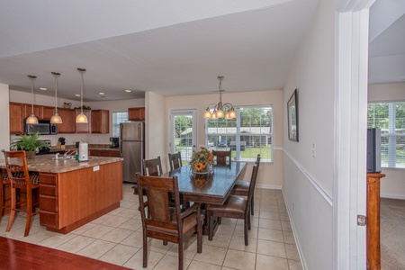 Dining room table with seating for six at A Pigeon Forge Retreat, a 2 bedroom cabin rental located in Pigeon Forge