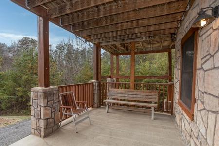 Porch access from the lower floor at Hibernation Station, a 3-bedroom cabin rental located in Pigeon Forge