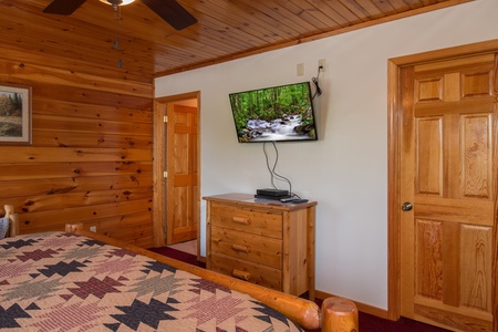 Dresser and TV in a bedroom at Moose Lodge, a 4 bedroom cabin rental located in Sevierville