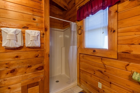 Shower in the upper bathroom at Hawk's Nest, a 1 bedroom cabin rental located in Pigeon Forge