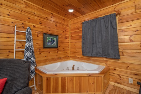 Jacuzzi in a bedroom at Whispering Grace, a 2 bedroom cabin rental located in Gatlinburg