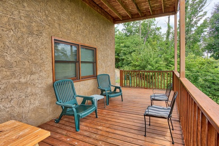 Seating on the deck at I Do Love Views, a 3 bedroom cabin rental located in Pigeon Forge