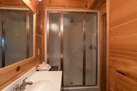 Bathroom with a shower at Graceland, a 4-bedroom cabin rental located in Pigeon Forge