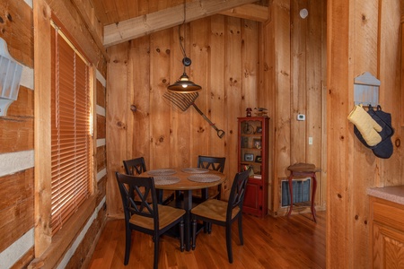 Dining table for four at Blue Mountain Views, a 1 bedroom cabin rental located in Pigeon Forge