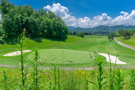 Pigeon Forge Golf Course is near Moonshiner's Ridge, a 1-bedroom cabin rental located in Pigeon Forge