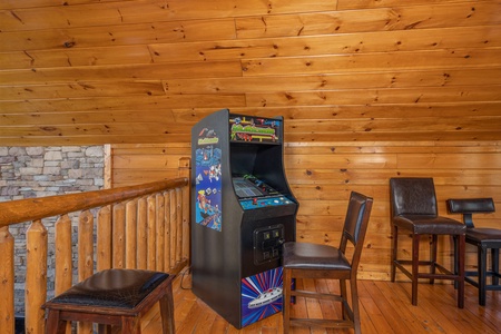 Arcade game at King of the Mountain, a 3 bedroom cabin rental located in Pigeon Forge