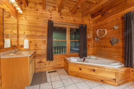 Corner jacuzzi tub at Family Getaway, a 4 bedroom cabin rental located in Pigeon Forge