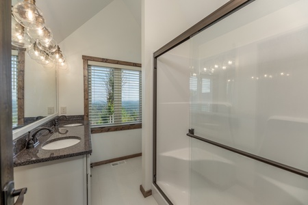 Bathroom with walk in shower at Mountain Celebration, a 4 bedroom cabin rental located in Gatlinburg