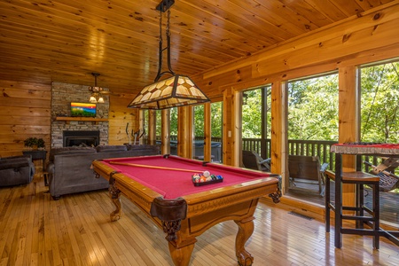 Pool table at Moonbeams & Cabin Dreams, a 3 bedroom cabin rental located in Pigeon Forge