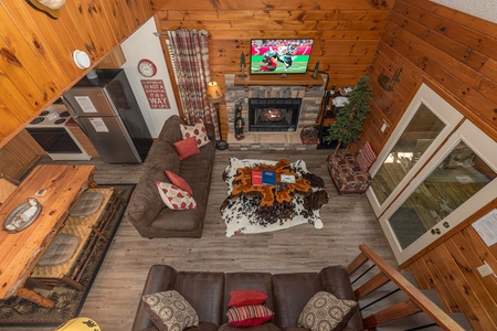 Looking down at the living room at Magic Moments, a 2 bedroom cabin rental located in Pigeon Forge