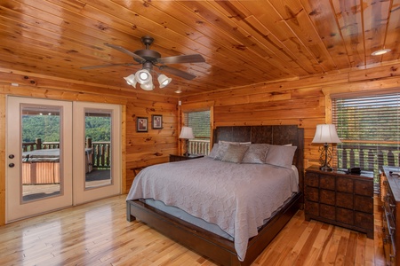 Bedroom with night stands and lamps at Majestic Views, a 3 bedroom cabin rental located in Pigeon Forge