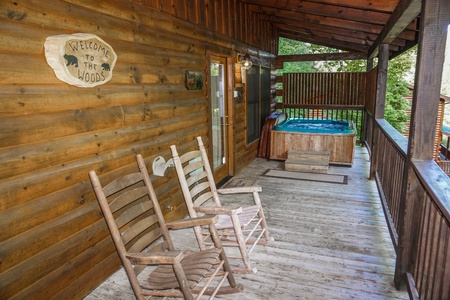 Rocking chairs on the deck at Bearly Mine, a 1-bedroom cabin rental in Pigeon Forge