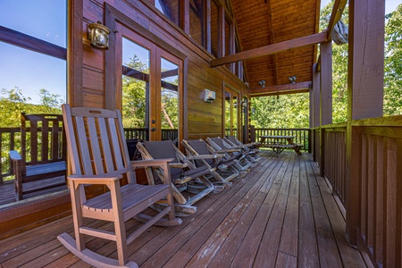 Wooden rocker at Moonbeams & Cabin Dreams, a 3 bedroom cabin rental located in Pigeon Forge