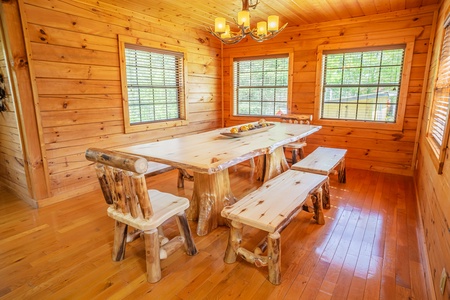 Dining table for 10 at 3 Crazy Cubs, a 5 bedroom cabin rental located in pigeon forge