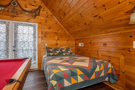 Lofted bedroom at Eagle's Nest, a 2 bedroom cabin rental located in Sevierville