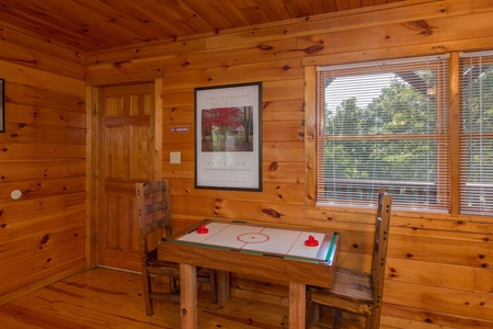 Air hockey at Moose Lodge, a 4 bedroom cabin rental located in Sevierville