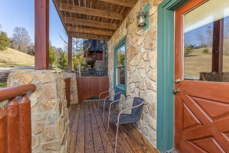 Two chairs on the lower deck at A Beary Nice Cabin, a 2 bedroom cabin rental located in Pigeon Forge