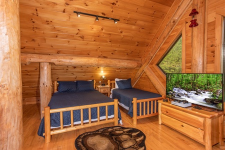 Room with three queen beds and two twin beds at Great View Lodge, a 5-bedroom cabin rental located in Pigeon Forge