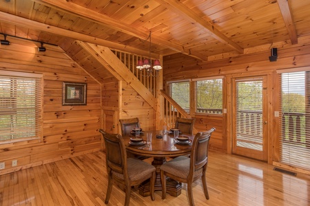 Dining table for four at Howlin' in the Smokies, a 2 bedroom cabin rental located in Pigeon Forge