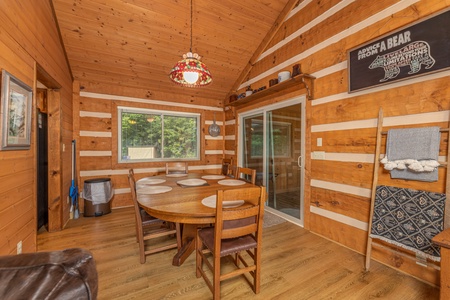 Dining table for six at Cubs' Crib, a 3 bedroom cabin rental located in Gatlinburg