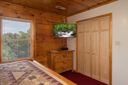 Dresser and TV in a bedroom at Moose Lodge, a 4 bedroom cabin rental located in Sevierville