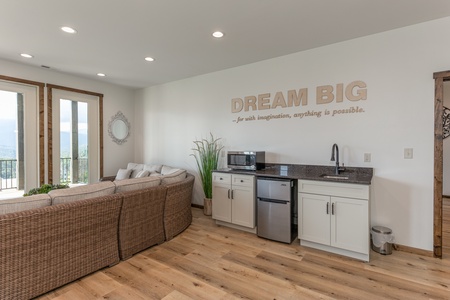 Kitchenette in the lower living room at Mountain Celebration, a 4 bedroom cabin rental located in Gatlinburg