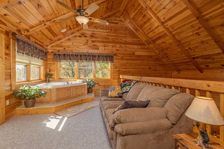 Loft with sleeper sofa and jacuzzi at Sensational Views, a 3 bedroom cabin rental located in Gatlinburg
