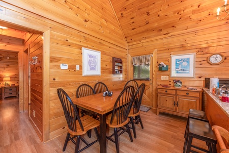 Dining room with seating for six at Grand View, a 3 bedroom cabin rental located in Sevierville