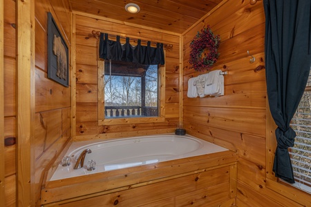 Jacuzzi tub at Honey Bear Haven, a 1 bedroom cabin rental located in Pigeon Forge