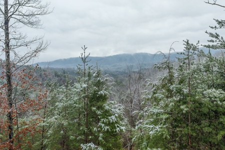 Snowy mountain views at Alpine Romance, a 2 bedroom cabin rental located in Pigeon Forge