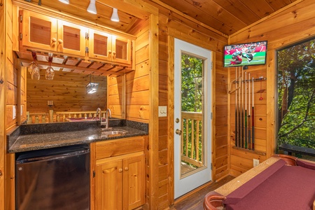 Kitchenette in the game room at Moonlit Pines, a 2 bedroom cabin rental located in Pigeon Forge
